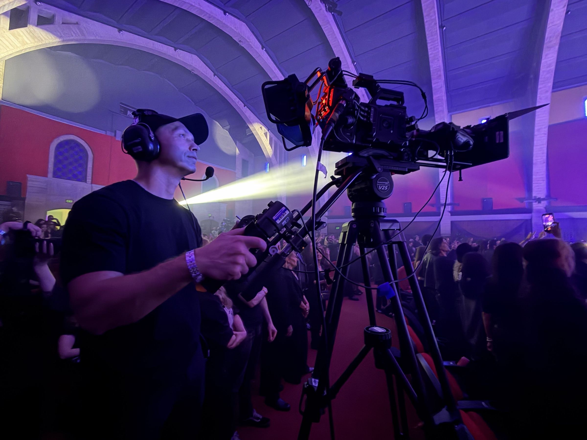 tvacom camera operator on a broadcast camera during a live show
